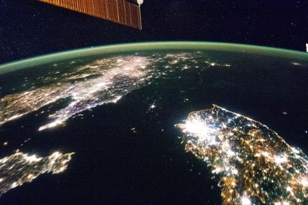 Satellite image of North and South Korea, showing the stark difference in their lighting.